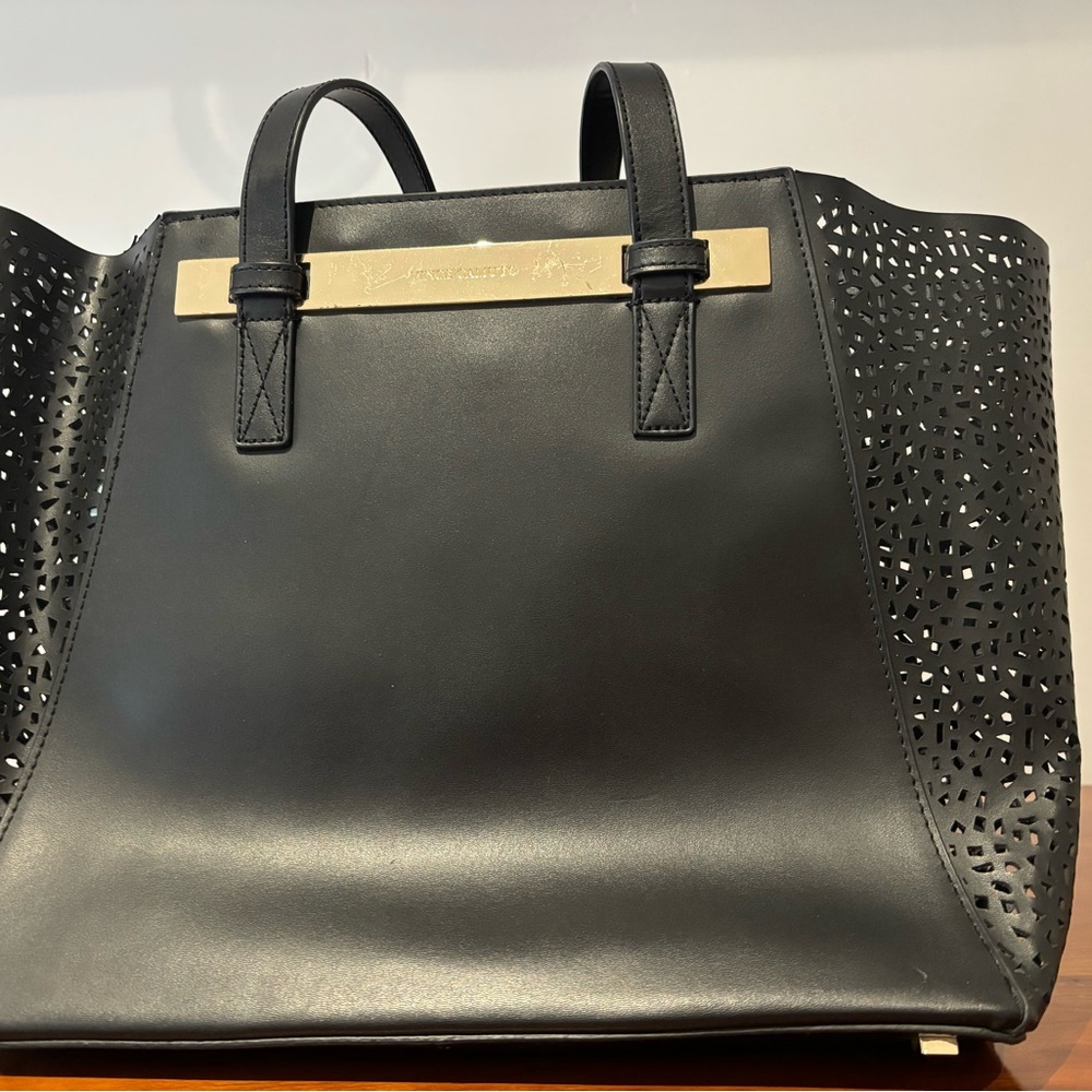 Vince Camuto leather tote with perforated sides and matching wristlet